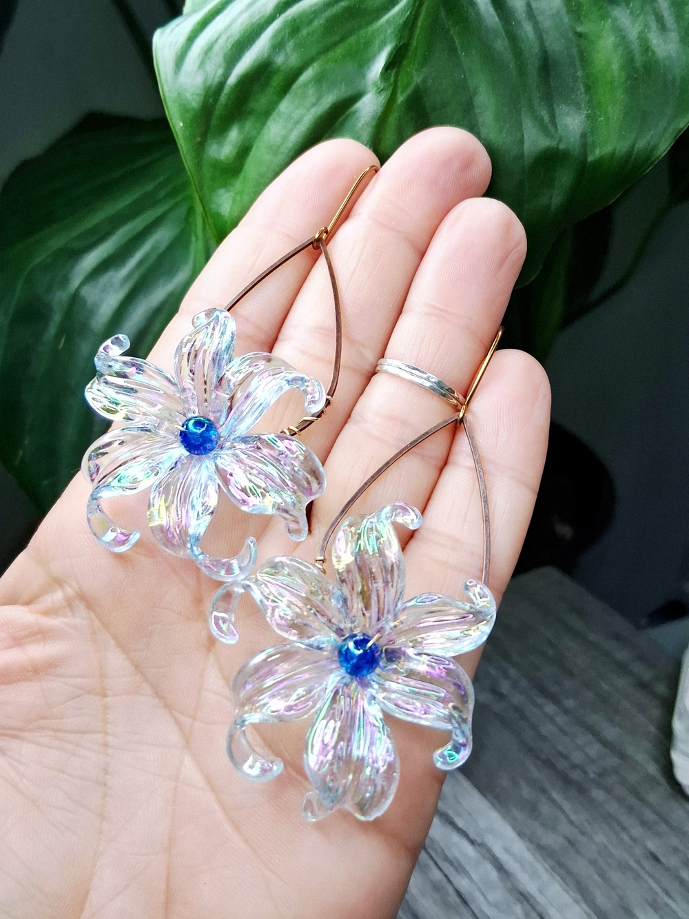 Iridescent Flower Drop Earrings with Blue Center